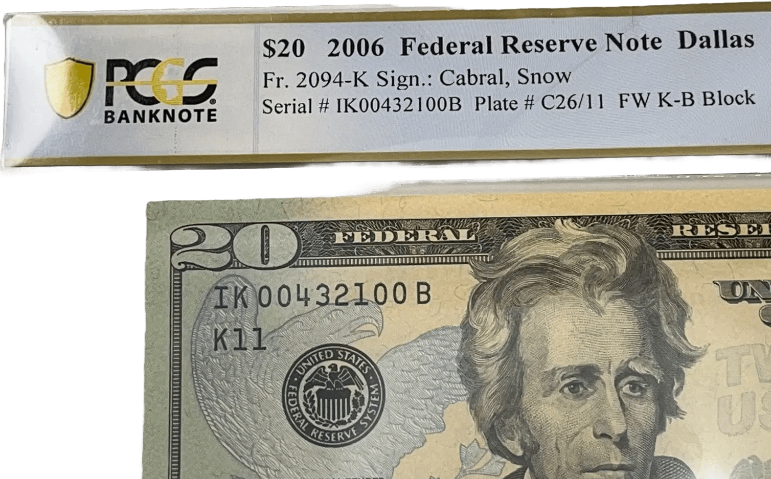 Close-up of 2006 $20 bill engraving details and rare reverse ladder serial number