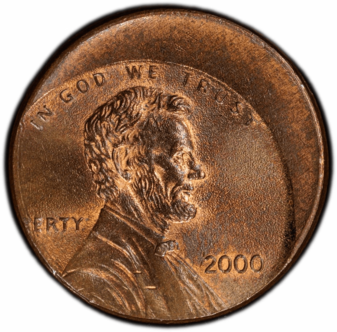 2000 Lincoln Memorial Cent MS64BN off-center strike error coin showing unstruck rim