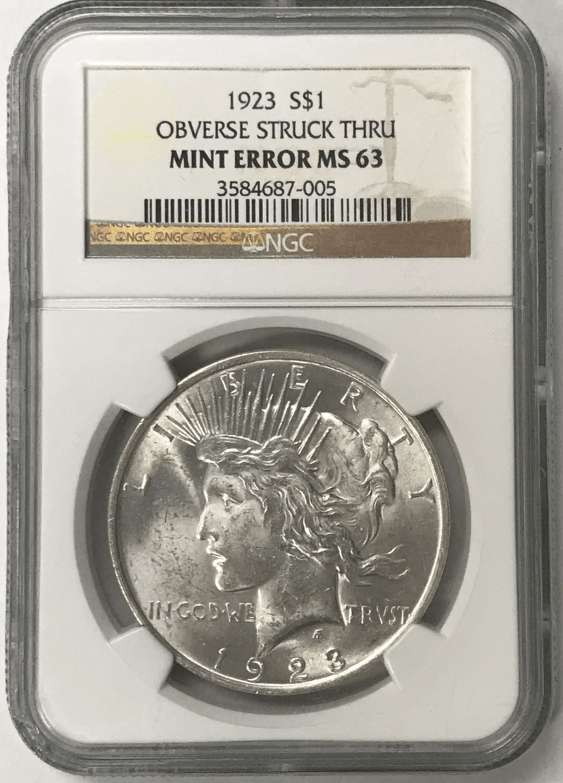 1923 S$1 Obverse Struck Thru Mint Error Peace Dollar obverse Liberty profile
