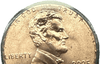 Close-up of 2025-D Lincoln cent showing raised IN GOD WE TRUST motto on rim edge