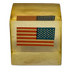 Vintage Lucite, acrylic, or resin paperweight with a US American flag embedded inside. Heritage Pastime